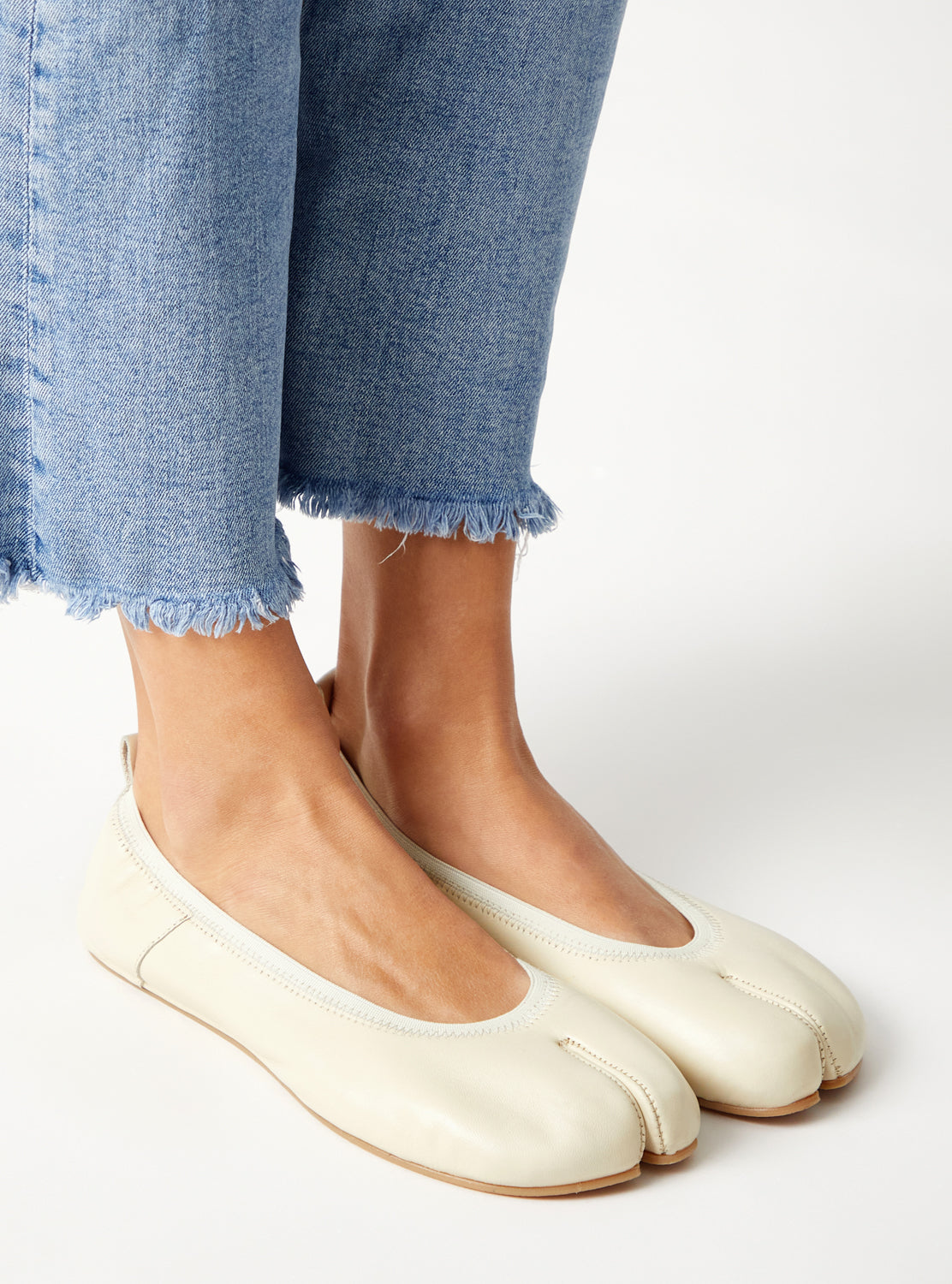 Off-white barefoot ballerinas