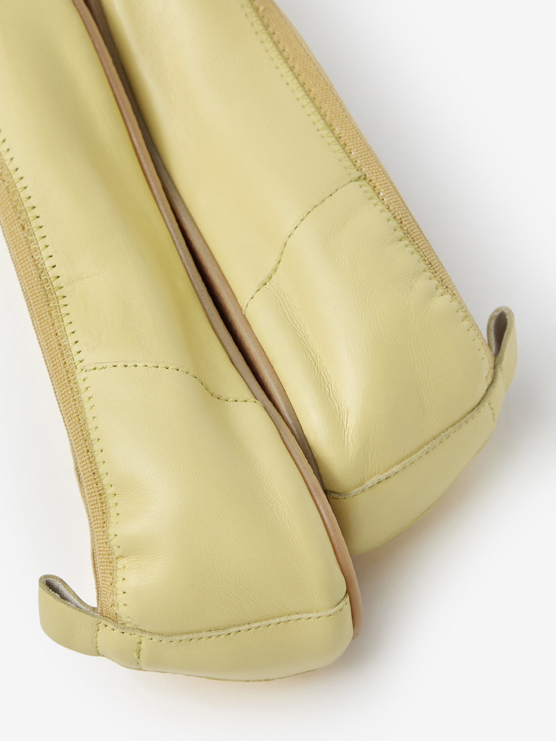 Barefoot yellow ballerinas