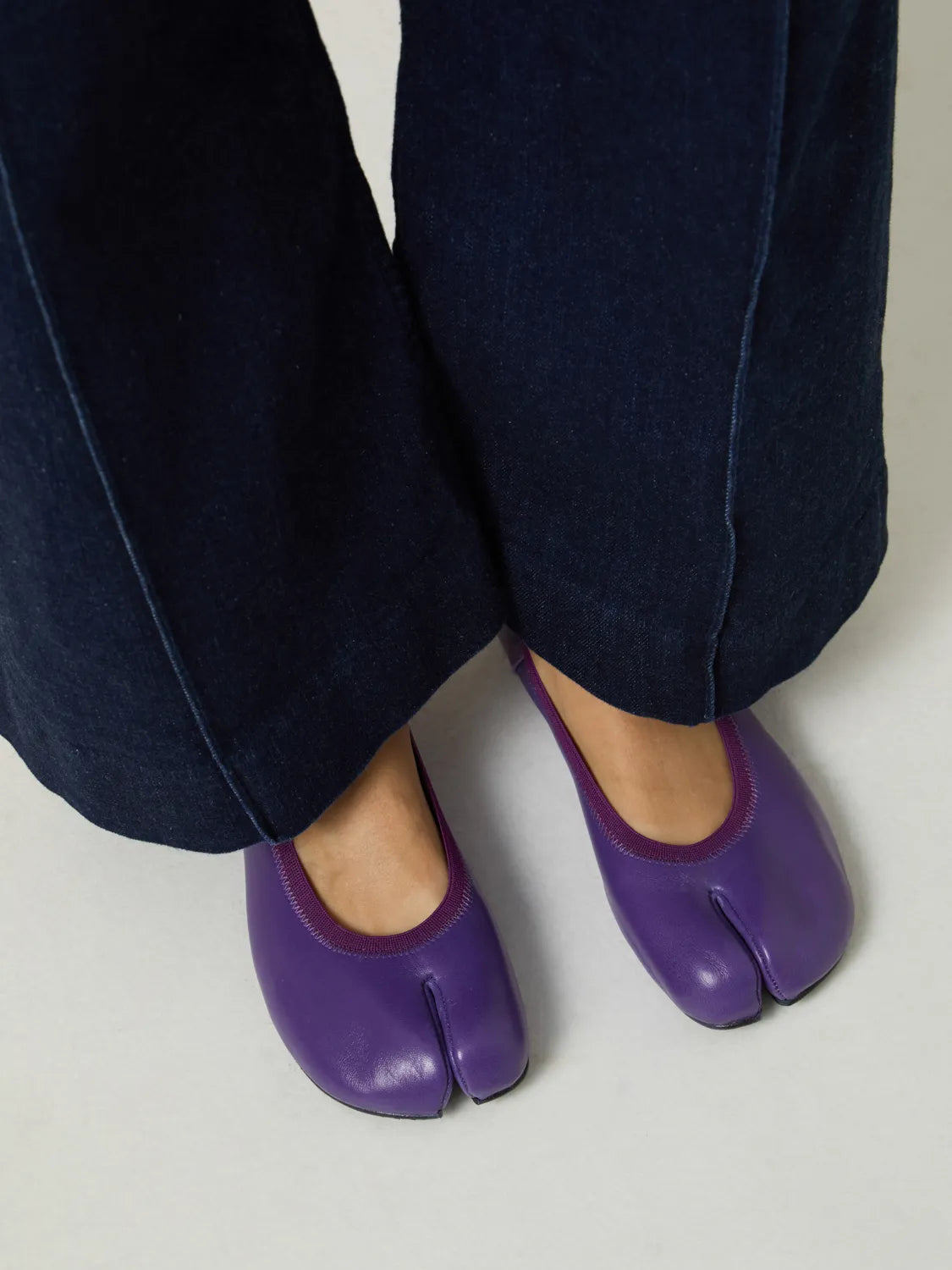 Purple barefoot ballerinas