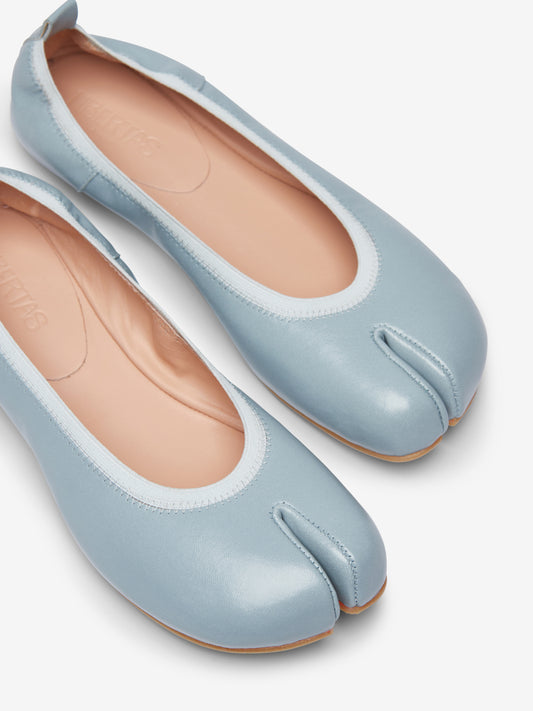 Barefoot light blue ballerinas