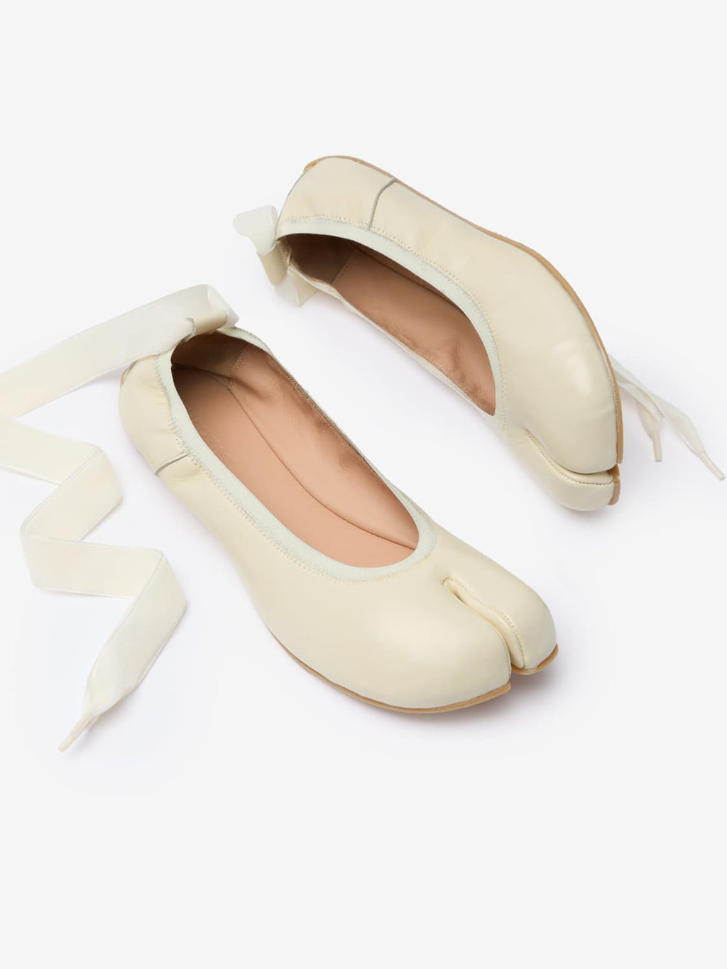 Barefoot off-white ballerinas