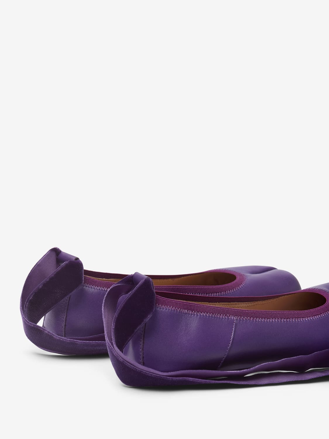Purple barefoot ballerinas